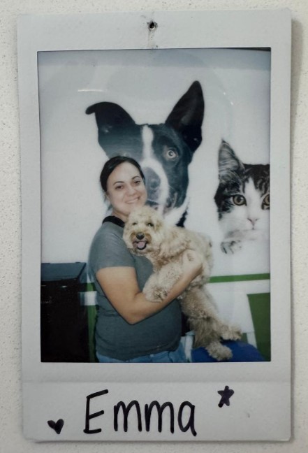 woman holding cheerful dog