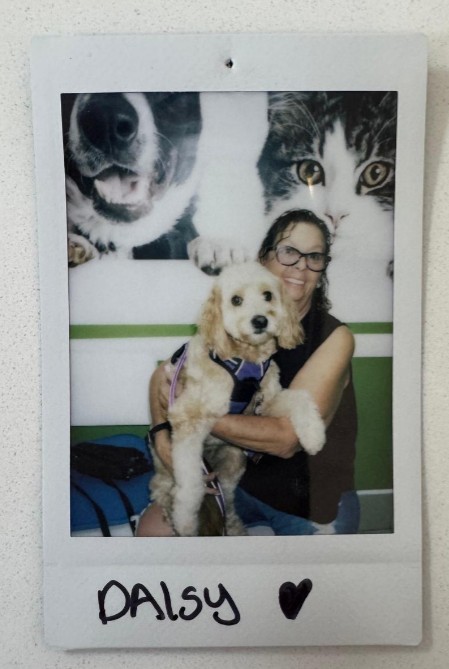 woman holding cute dog
