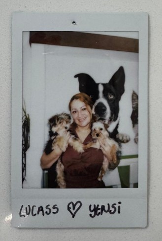 woman with three dogs